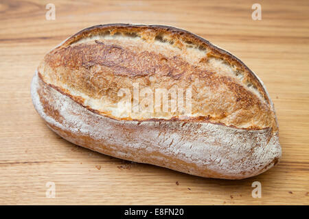 Close-Up of a loaf of fresh bread on a table Stock Photo