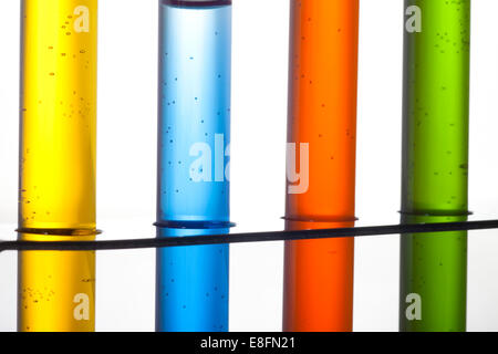 Close up of test tubes in rack Stock Photo