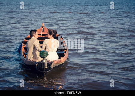 Netherlands, Rear view of couple during boat trip Stock Photo