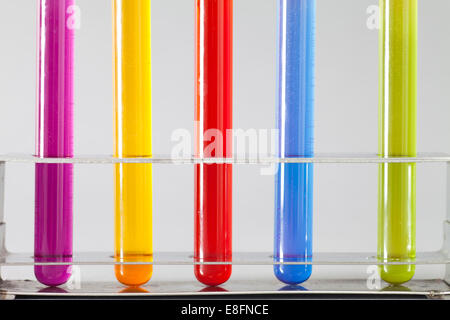 Multi-colored Test tubes in rack Stock Photo