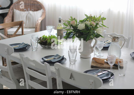 Dining table set for lunch Stock Photo