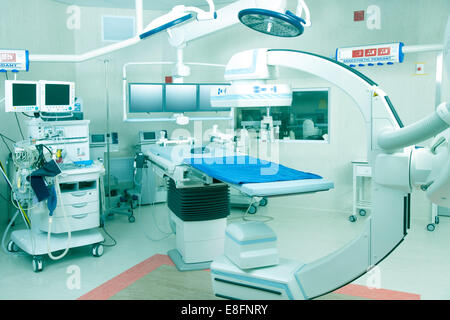 Operating room in hospital with robotic imaging system Stock Photo