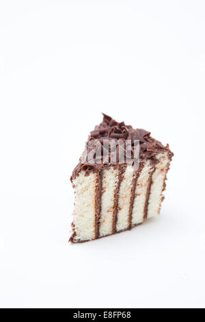 Close-up of a Slice of Chocolate cake on a table Stock Photo
