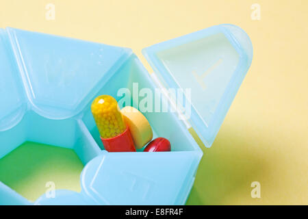 Pills in pill box Stock Photo