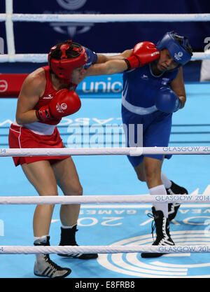 Shelley Watts (AUS) (Red) beats Laishram Devi (IND) (Blue) - Boxing Women's Light 57-60kg - The SSE Hydro - Glasgow - UK - 02/08 Stock Photo