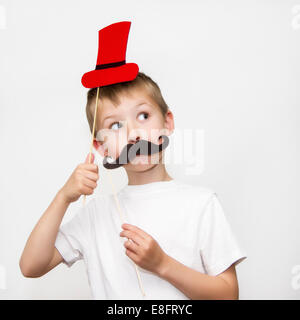 Boy with moustache and hat masks Stock Photo