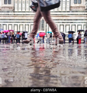 Italy, Tuscany, Florence, Tourists waiting in line to enter cathedral Stock Photo