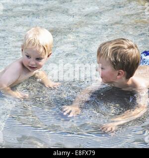 Boys in water Stock Photo