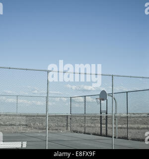 USA, Wyoming, View of outside basketball court in desert Stock Photo