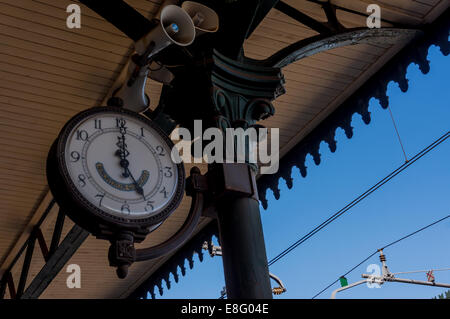 Old clock in Taormina train station, Sicily Stock Photo