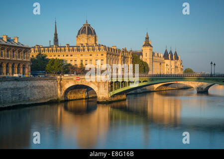 Early morning sunlight on the Conciergerie, Pont Notre Dame, and the buildings of Ile-de-la-Cite, Paris, France