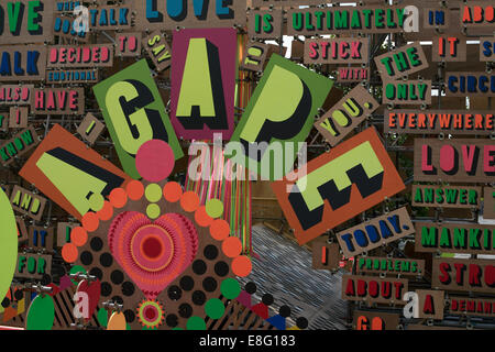 Collage of words in many colours largest word is agape Stock Photo