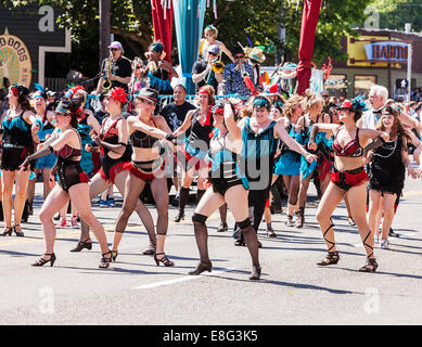 Dance Troupe Performs In Parade Stock Photo