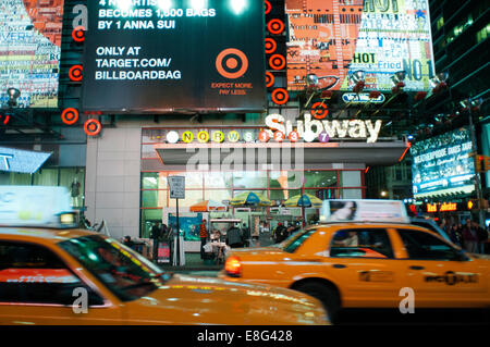 Taxis around Times Square Subway. 1560 Broadway, between 46th and 47th Street . Telephone 212-869-5667 (8:00 to 20:00) . Nearly Stock Photo