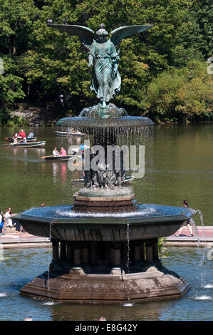 Bethesda Fountain, Central Park, New York City. The sculpture is call Angel of Waters and was designed by Emma Stebbins in 1873. Cental Park. Bethesda Fountain and Terrace. On the south side of the pond is this square that culminates in a huge circular fountain with a statue called Angel of the Waters instituted here in 1842. From the top of the stairs you have good views of the source to the lake bottom. Stock Photo