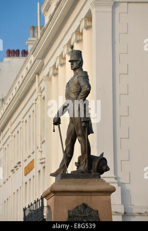 Bronze statue of a Royal Sussex Regiment Soldier in full dress uniform. Eastbourne. East Sussex Stock Photo