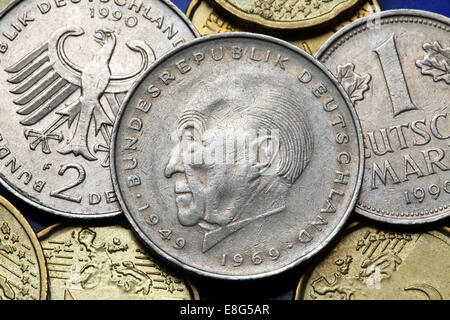 Coins of Germany. German statesman Konrad Adenauer and the German eagle depicted in old Deutsche Mark coins. Stock Photo