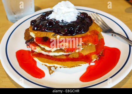Naples Florida,IHOP,restaurant restaurants food dining eating out cafe cafes bistro,interior inside,plate,dish,pancakes,stack,syrup,blueberry,visitors Stock Photo