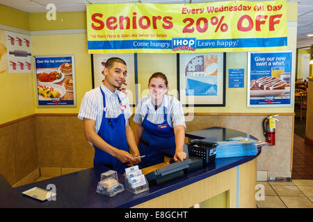 Naples Florida,IHOP,restaurant restaurants food dining eating out cafe cafes bistro,interior inside,waiter waiters server servers employee employees w Stock Photo