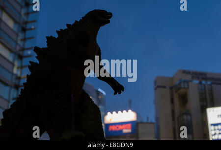 Godzilla ( toy )  in Roppongi Tokyo at night Stock Photo