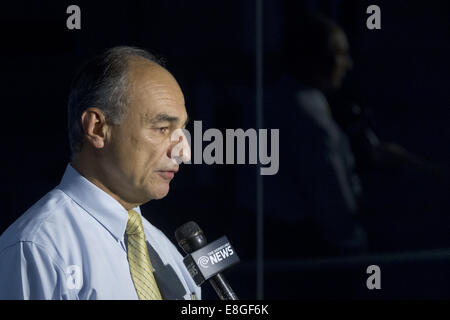 Goshen, New York, USA. 7th Oct, 2014. Orange County Department of Emergency Services Commissioner WALTER KOURY gives an interview during a full-scale Federal Emergency Management Agency (FEMA) exercise designed to test the county's emergency preparedness plan in.the event of a disaster or attack at the nuclear-powered Indian Point Energy Center in Westchester County. The drill took place at the Orange County Emergency Services Center in Goshen, New York. Westchester, Rockland and Putnam counties also participated in the drill, which focused on Hostile Action-Based (HAB) emergency response Stock Photo