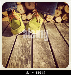 close up of a man wearing green suede shoes Stock Photo