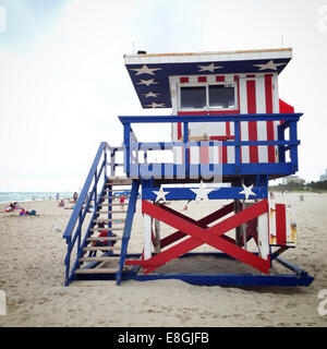Stars and stripes on lifeguard hut, United States Stock Photo