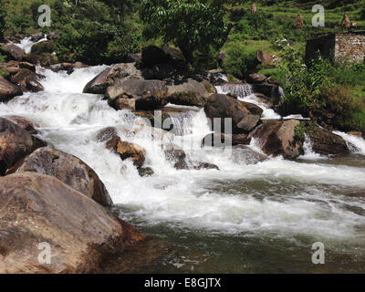 River flowing over rocks Stock Photo