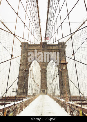 Brooklyn Bridge in snow, New York, United States Stock Photo