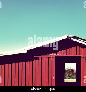 USA, California, Central Valley, Red barn doors Stock Photo