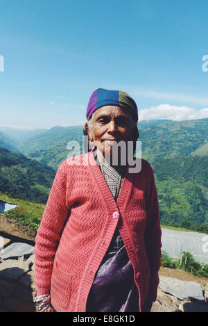 Portrait of local Nepalese woman in a mountain village, Nepal Stock Photo