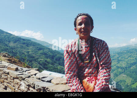 Portrait of local Nepalese woman in a mountain village, Nepal Stock Photo