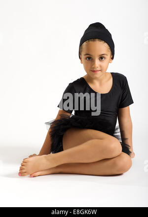 Young ballerina sitting Stock Photo