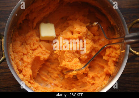 Sweet Potato Mash with a knob of butter Stock Photo