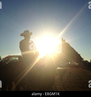 USA, Washington DC, Silhouette of a cowboy on horse Stock Photo