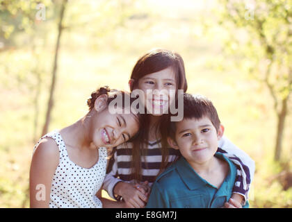 Portrait of three children smiling Stock Photo