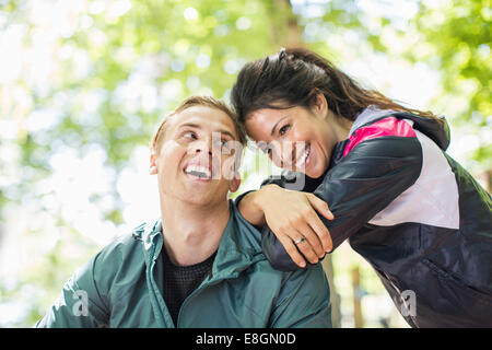 Happy multi-ethnic fit couple outdoors Stock Photo