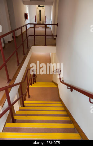 Looking down stairs inside building. Stock Photo