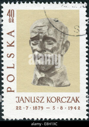 POLAND - CIRCA 1962: Postage stamp printed in Poland, shows a sculpture of Janusz Korczak by Xawery Dunikowski, circa 1962 Stock Photo