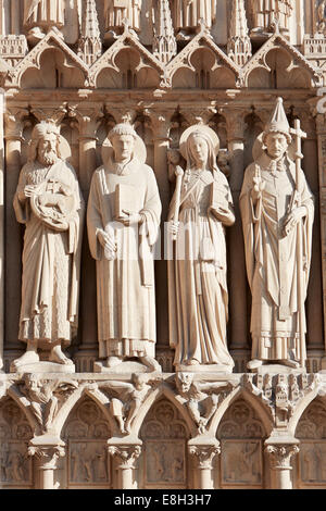 Notre Dame de Paris statues of saints on the cathedral facade Stock Photo