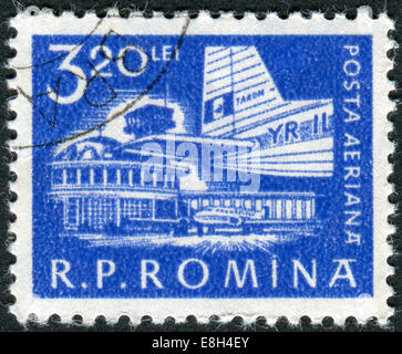 Postage stamp printed in Romania shows Airplane at Bucharest Airport Stock Photo