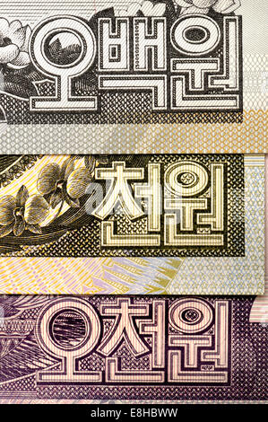 Detail from North Korean banknotes showing Korean (Hangul) numerals 500, 1000, 5000 Stock Photo
