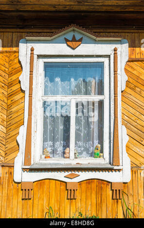 Carved window in old russian  country house Stock Photo