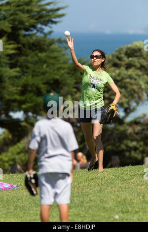 Mother and 7 year old son playing catch at a park, Del Mar, San Diego, California Stock Photo
