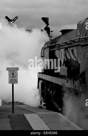 West Country class Pacific No 34046 'Braunton' departing from Westbury with the 'Torbay Express' steam excursion 13th July 2014. Stock Photo