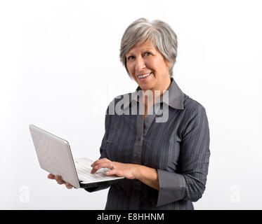 Smiling Woman Holding Laptop Stock Photo
