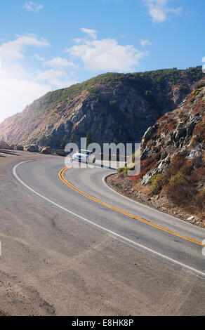car driving on Pacific Coast Highway along the ocean near Big Sur California Stock Photo