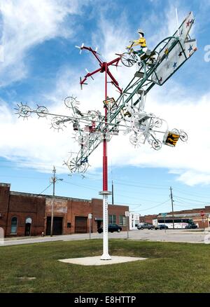 Wilson, North Carolina, USA. 08th Oct, 2014. One of the first fully restored whirligigs by artist Vollis Simpson now up and twisting in the wind at Whirligig Park. Mr. Simpson, who died 2013 at the age of 94, made scores of whirligig sculptures over his lifetime, 31 of which will eventually be restored and installed at the park in Historic Downtown Wiilson. © Brian Cahn/ZUMA Wire/Alamy Live News Stock Photo