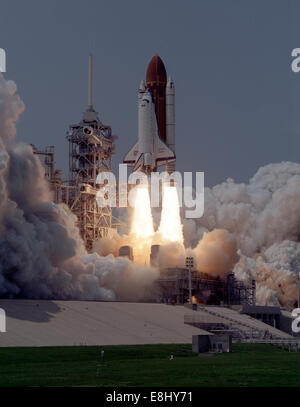 Space Shuttle Atlantis (STS-30) launches from Kennedy Space Center, deploying payloads for Magellan and Venera missions. The mission supports planetary research, satellite operations, spacecraft technology, aerospace engineering, mission planning, and scientific observation. Stock Photo