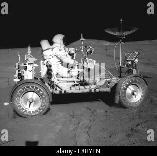 REF: JSC-AS15-85-11471-(MIX FILE) Apollo 15 Onboard Photo: LRV with Astronaut on Lunar Surface Lunar Roving Vehicle, Apollo 15 M Stock Photo